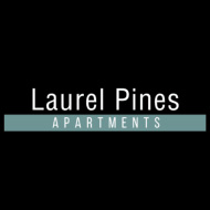 A black background with the words "Laurel Pines Apartments" in white.